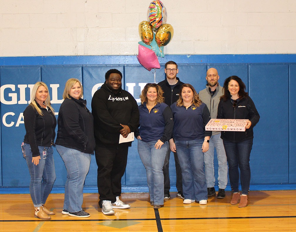 Students from boys and girls club posing for a picture
